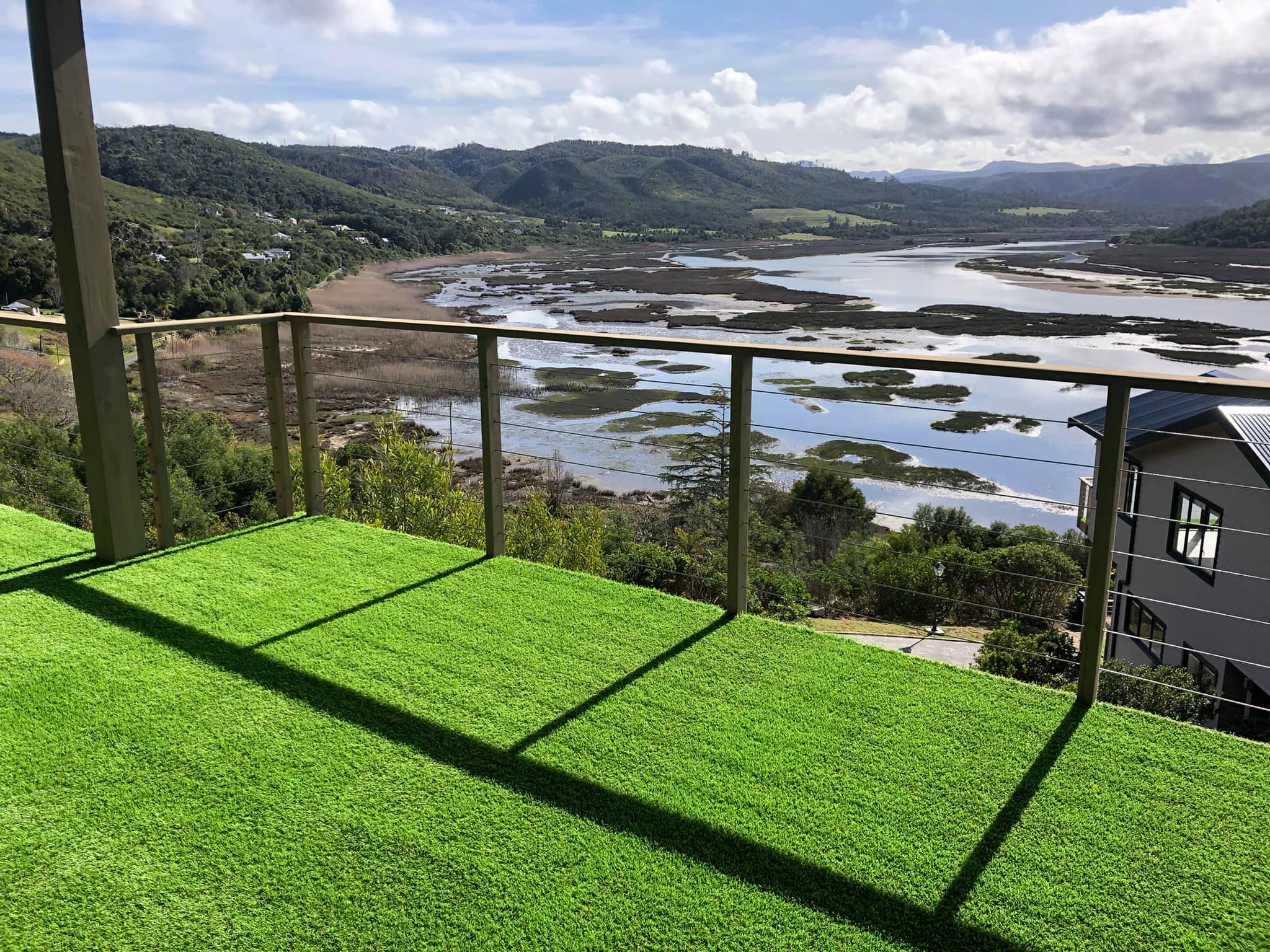 Artificial-grass deck covering overlooking the Knysna estuary