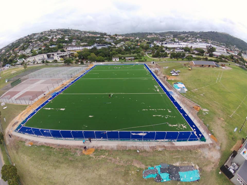 Aerial view of an artificial-turf hockey field in Knysna