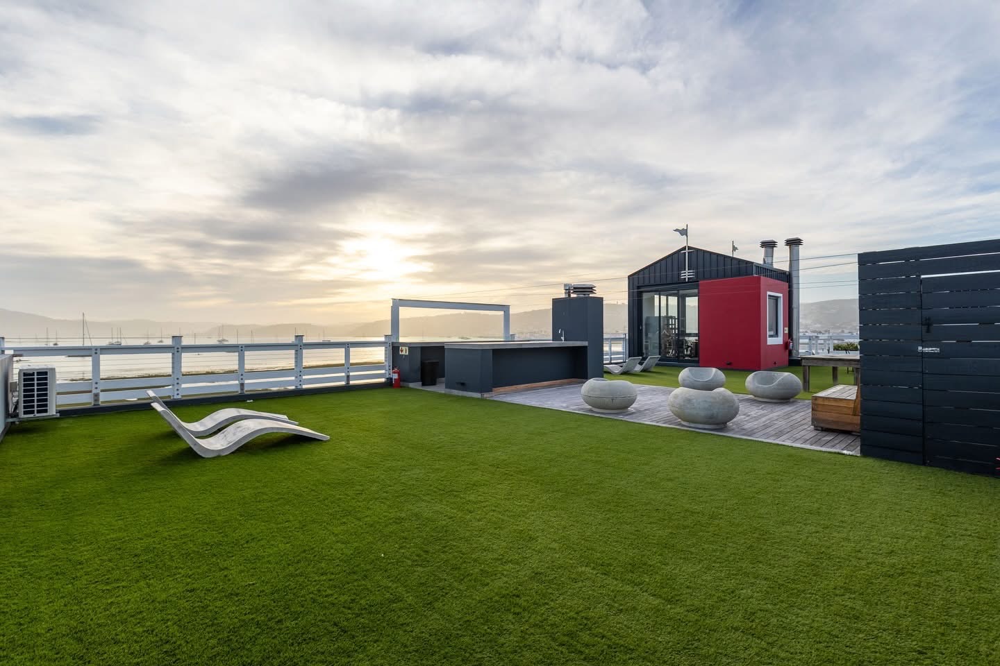 Artificial turf rooftop terrace overlooking the waterfront